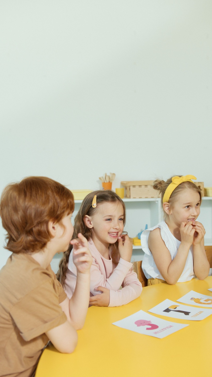 Children laughing together in a group session