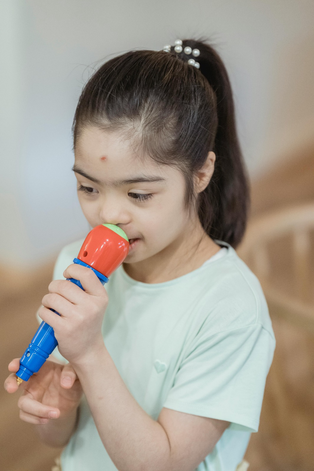 A child engaging in a speech and language therapy activity